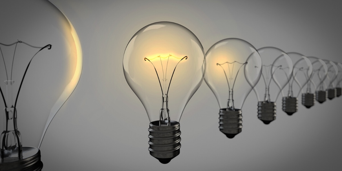 A young Black woman leads her team in a project meeting