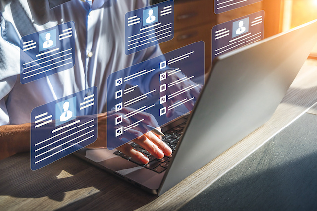 Graphic representing a hiring manager using a resume database.
