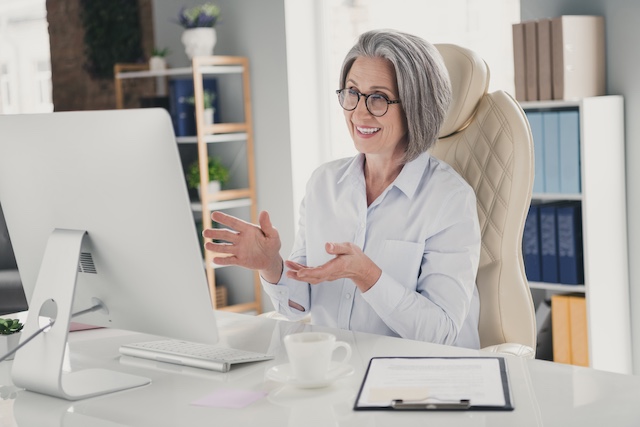 Female career coach meets with a client online